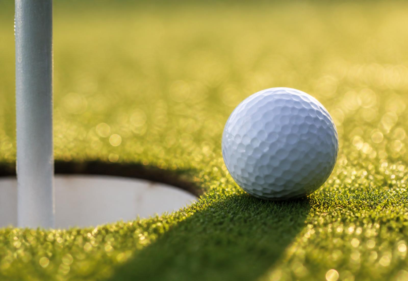 Manicured golf green near a luxury home for sale in Quebec, Canada
